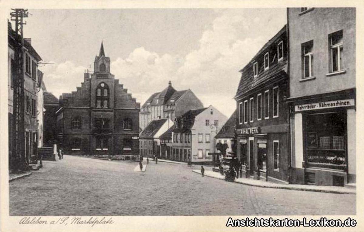 Alsleben (Saale). Marktplatz und Fahradgeschäft