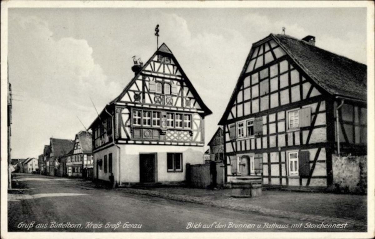 Büttelborn. Brunnen, Rathaus, Storchennest, Fachwerkhäuser, 1939