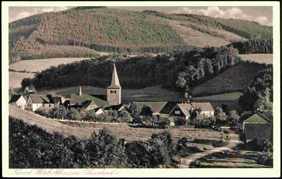 Eslohe (Sauerland). Wenholthausen - Blick auf Ort mit Kirche
