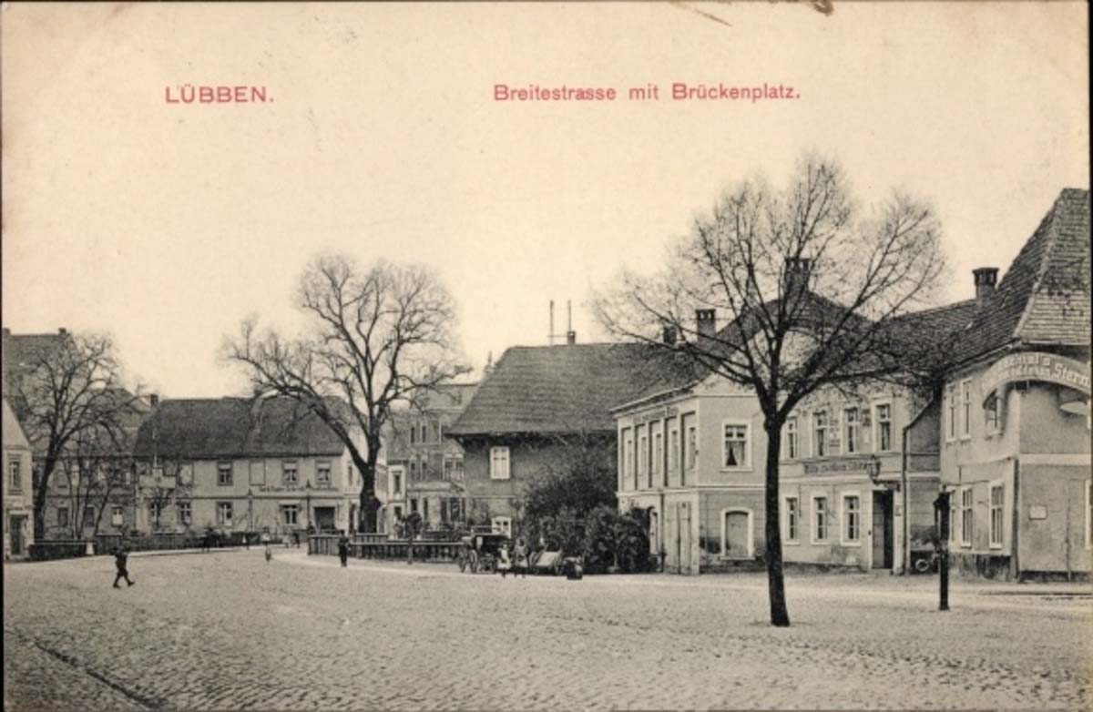 Lübben (Spreewald). Breite Straße mit Brückenplatz, Hotel zum goldenen Stern, 1909