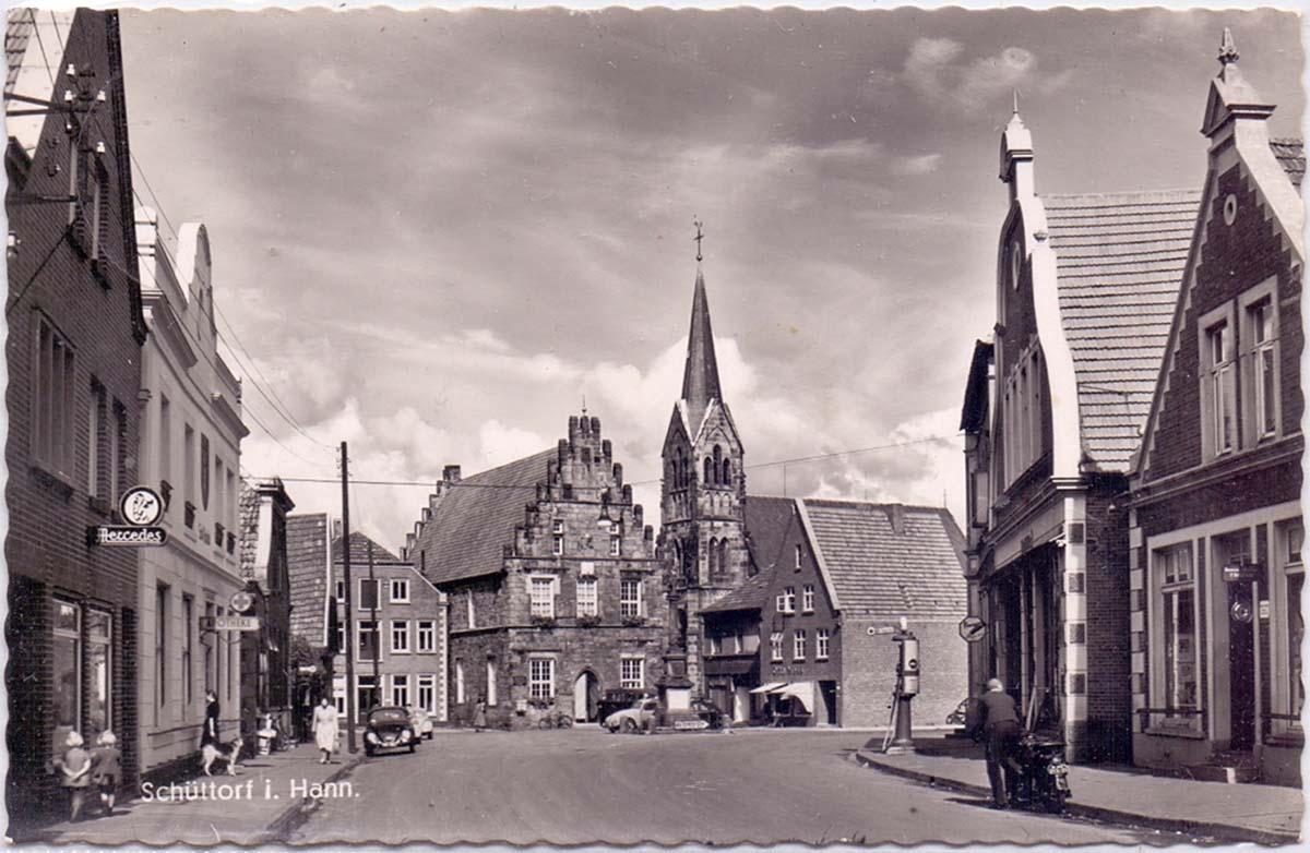 Schüttorf. Kirche, Tankstelle am straße, 1953