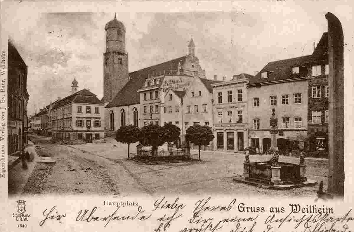 Weilheim in Oberbayern. Marienplatz, St Mariä Himmelfahrt Kirche, Mariensäule, Brunnen