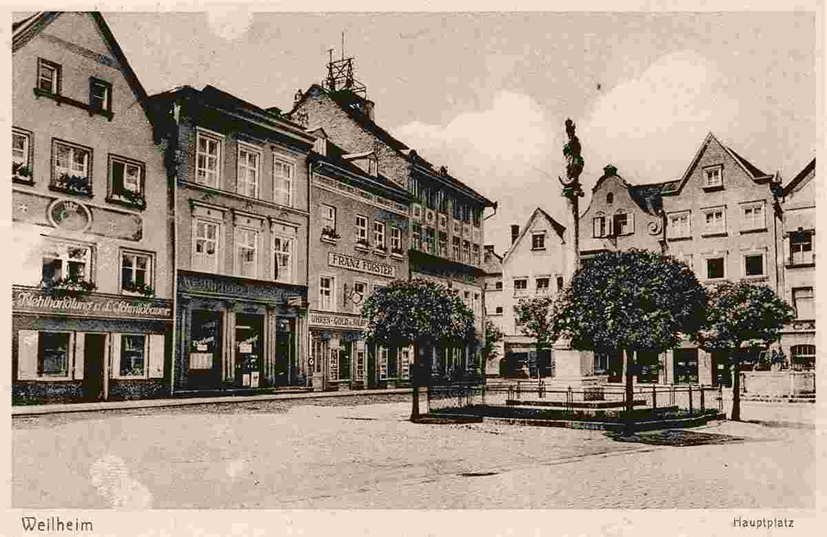 Weilheim in Oberbayern. Marienplatz, Mariensäule, Mehlhandlung